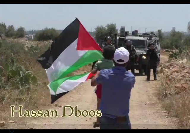 Palestinian child pushed towards soldier video screen shot